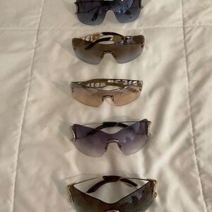 5Womens sunglasses and cases, AS IS, no returns, used.
